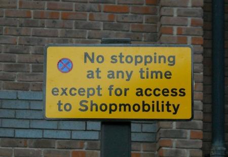 Sign adjacent to bay on Handyside place states ‘No stopping at any time except for access to Shopmobility’