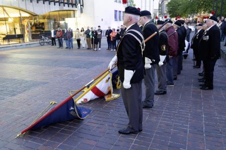 Veterans from the Royal Fusiliers lower the standard on ceremonial way.