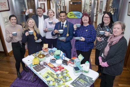 The Lord Mayor's Business Coffee Morning for Fairtrade Fortnight 2022, with attendees holding Fairtrade Coffee Cups in the Silver Gallery at the Civic Centre.