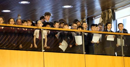 Choir of primary school children sing at the Holocaust Memorial Day Commemorative event