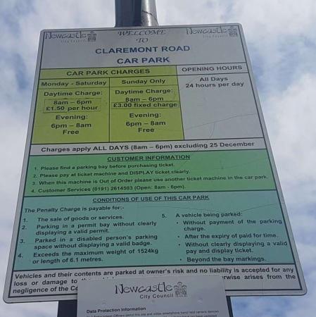 Tariff board advising of parking charges and terms and conditions of use of the car park