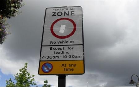 Pedestrian zone sign states ‘Pedestrian Zone’ has the no entry sign ‘ no vehicles except for loading 4.30pm – 10.30am’ there is also a no waiting symbol and advise that there is no waiting at any time