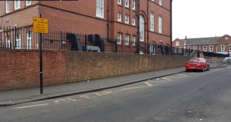Markings outside of school ‘school keep clear’ with yellow no stopping sign