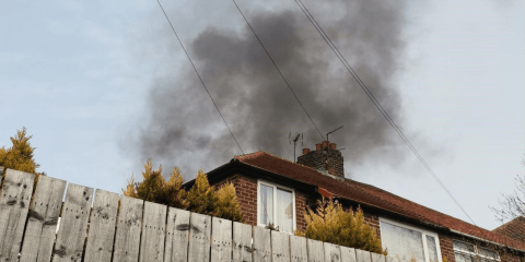 Black smoke rises into the afternoon air from Michael McLanaghan’s illegal bonfire on Swinley Gardens in Newcastle 