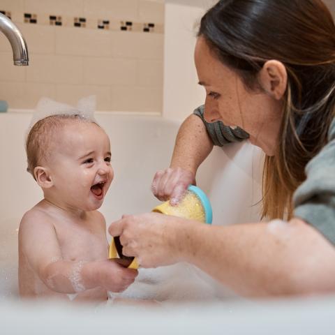 Smiling baby and mother