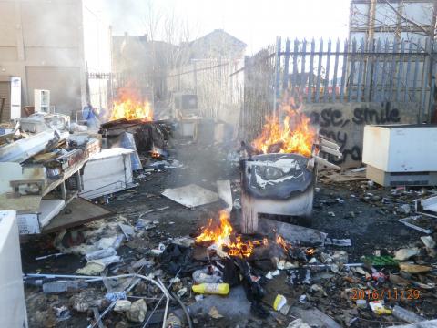 Burning waste at Bentinck Road