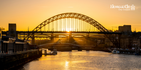 The Tyne Bridge silhouetted against the sun