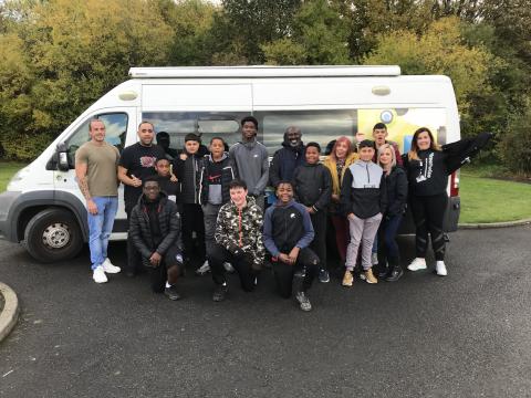 Young People, staff from Streetwise and Edge celebrating with the Youth Van during outreach work in Newburn. 