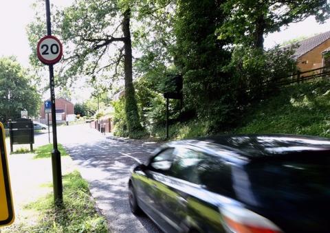 Image of car driving down Salters Bridge