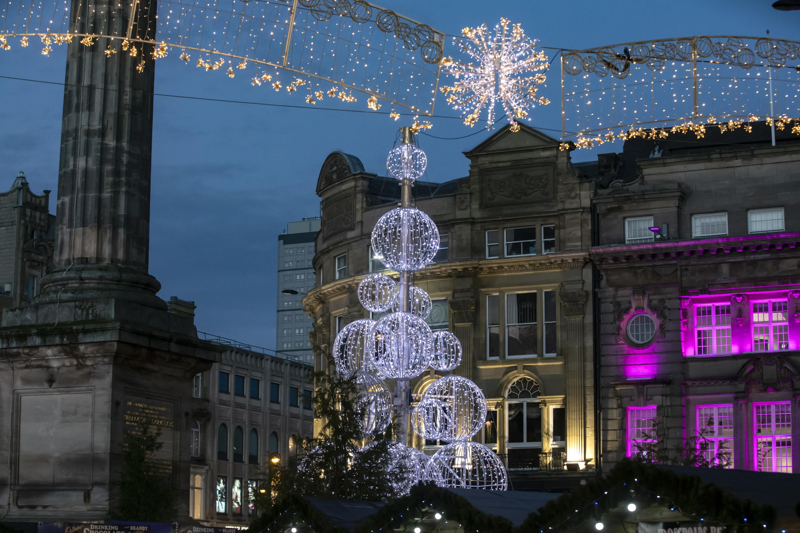 Festive scene and lights at Grey's Monument 
