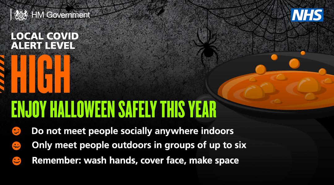 Halloween graphic with information asking people to enjoy Halloween safely this year and reminding people that the local Covid alert level is high.