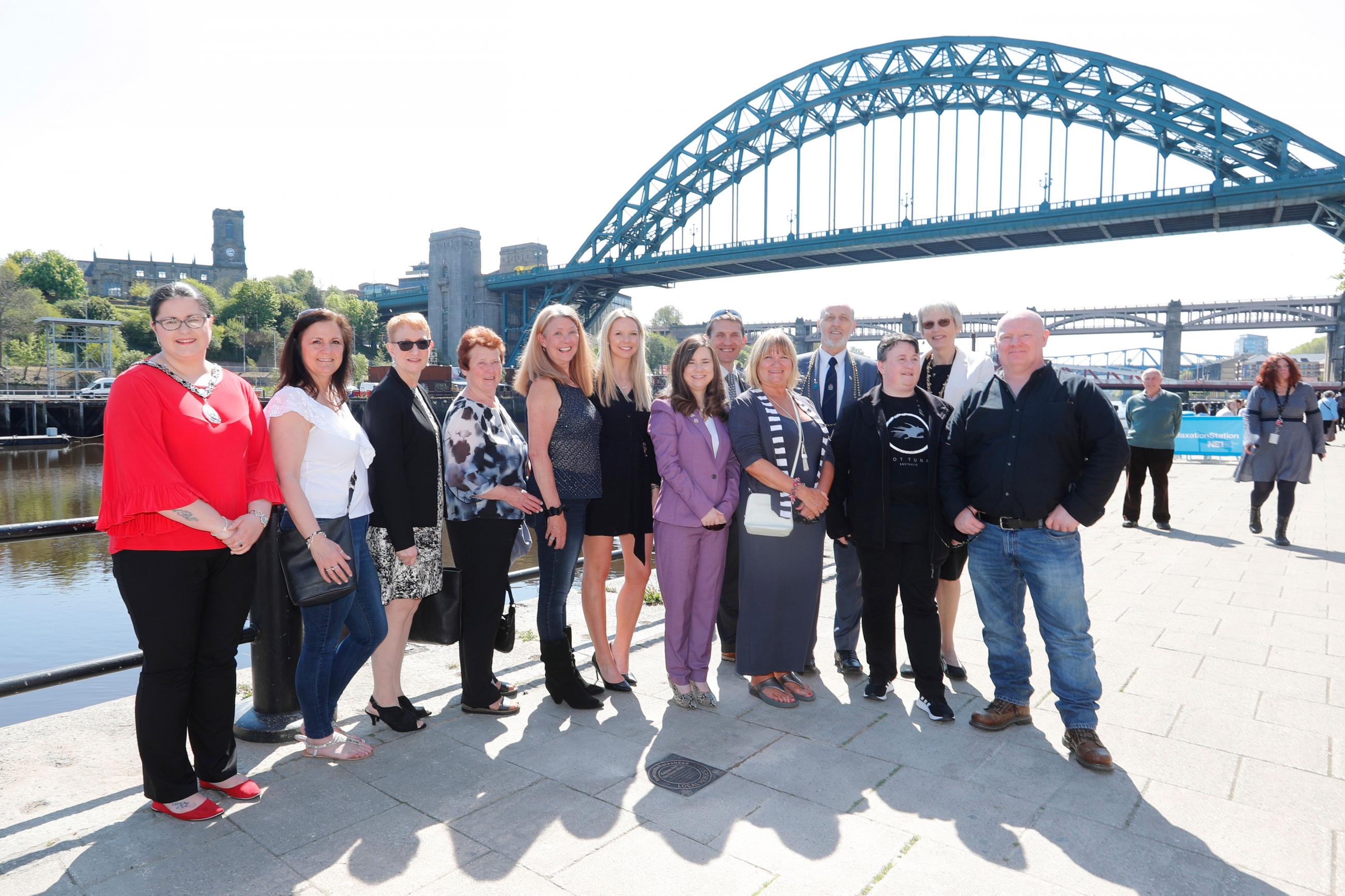 Kaylee Davidson-Olley with friends and family as she is honoured as a Local Hero