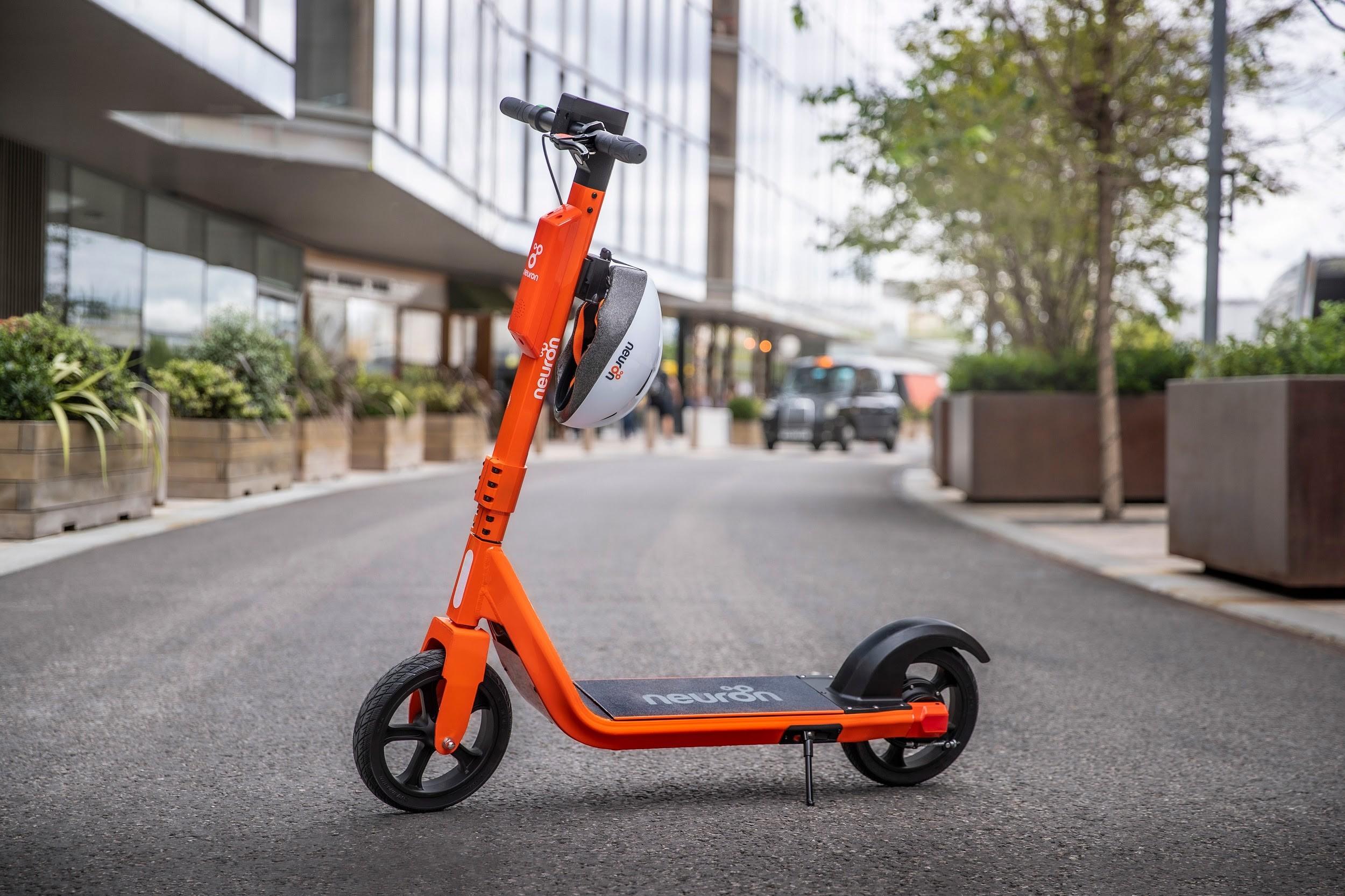 Photo showing an orange e-scooter