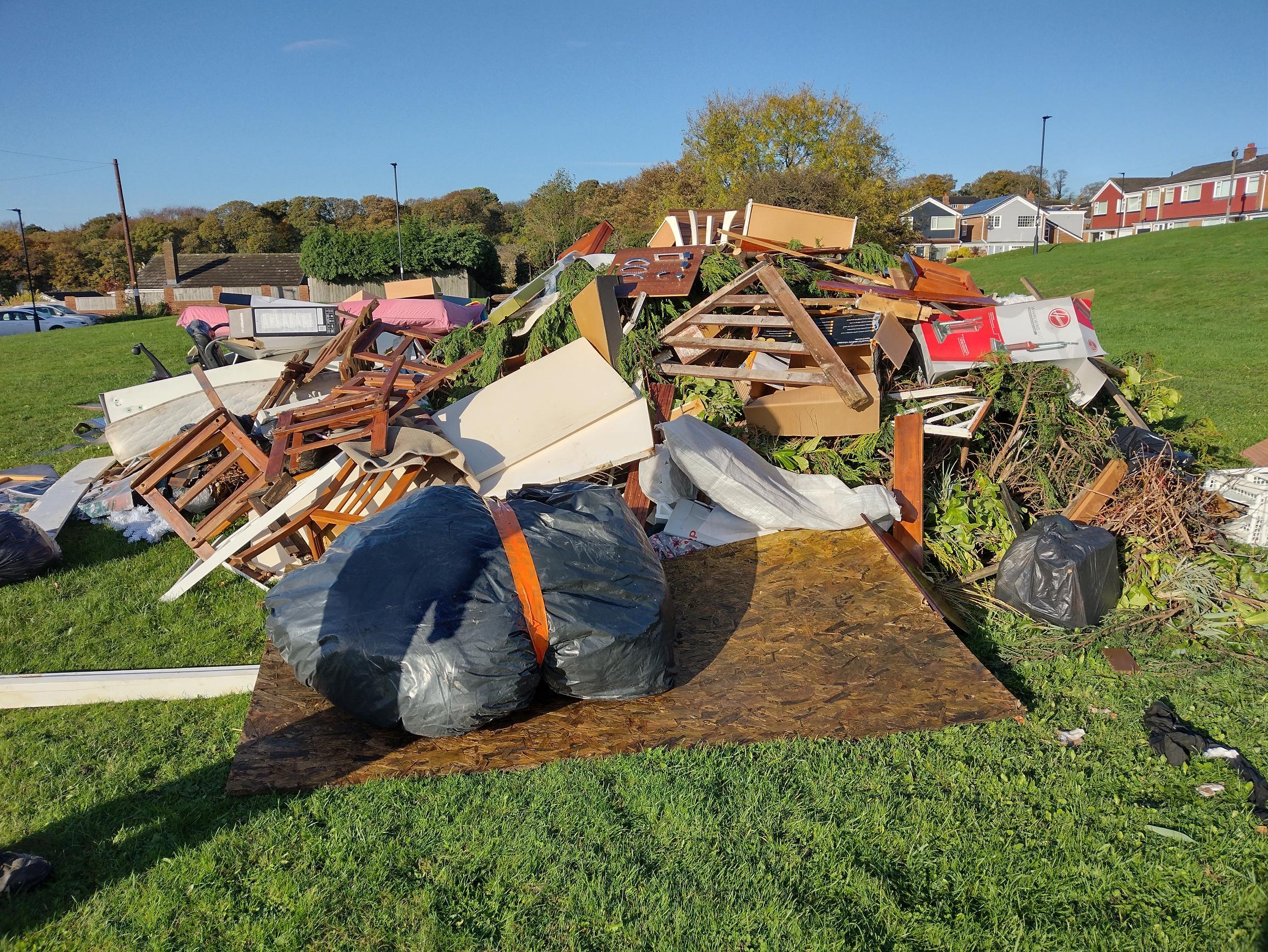 Pile of rubbish dumped on land off Wallington Drive