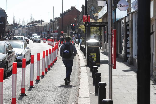 The proposals would see one lane of traffic each way retained through the main stretch of the High Street but without the current bollards in place. 