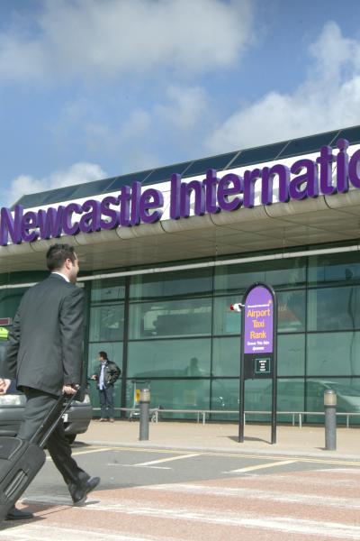 A man entering Newcastle airport